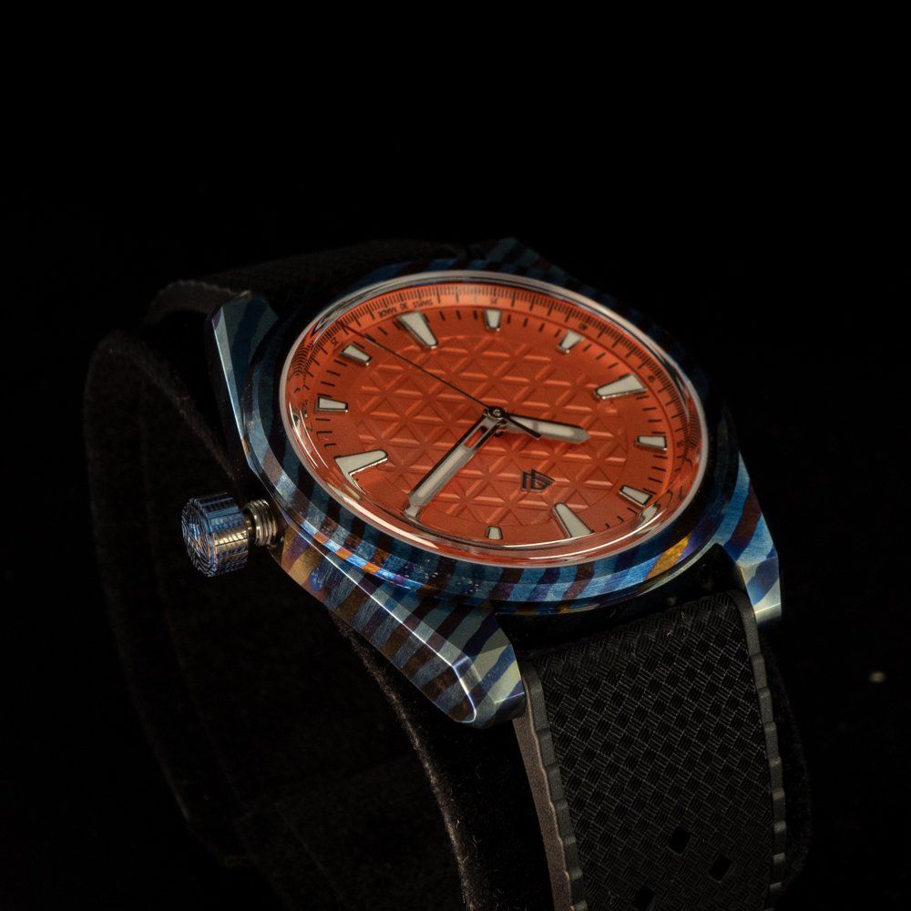 A close up of a watch on a black background