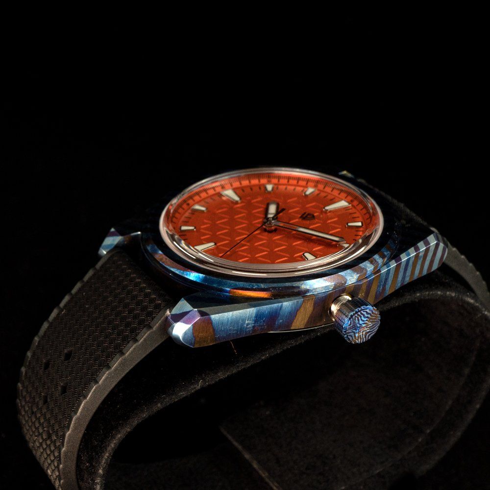 A close up of a watch on a black background