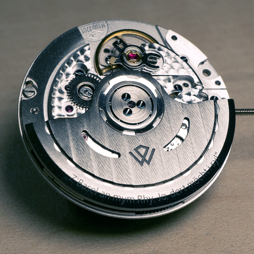 A close up of the inside of a watch mechanism