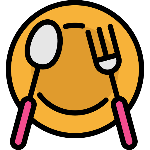 Piatto giallo con cucchiaio e forchetta che disegnano un volto sorridente.