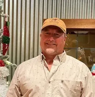 guy with tan hat