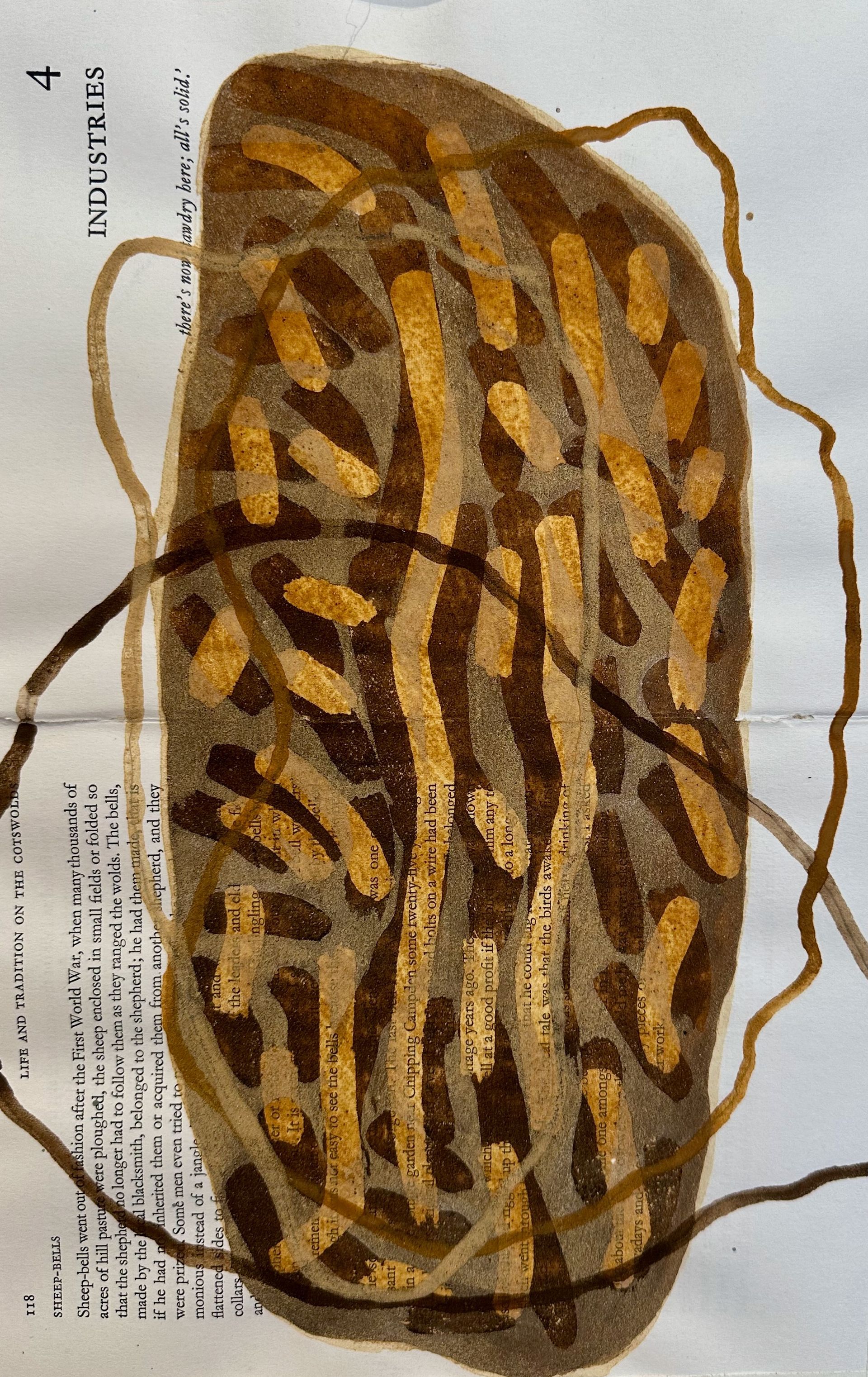 Abstract brown-and-gold woven oval mat with loose cords on a light background