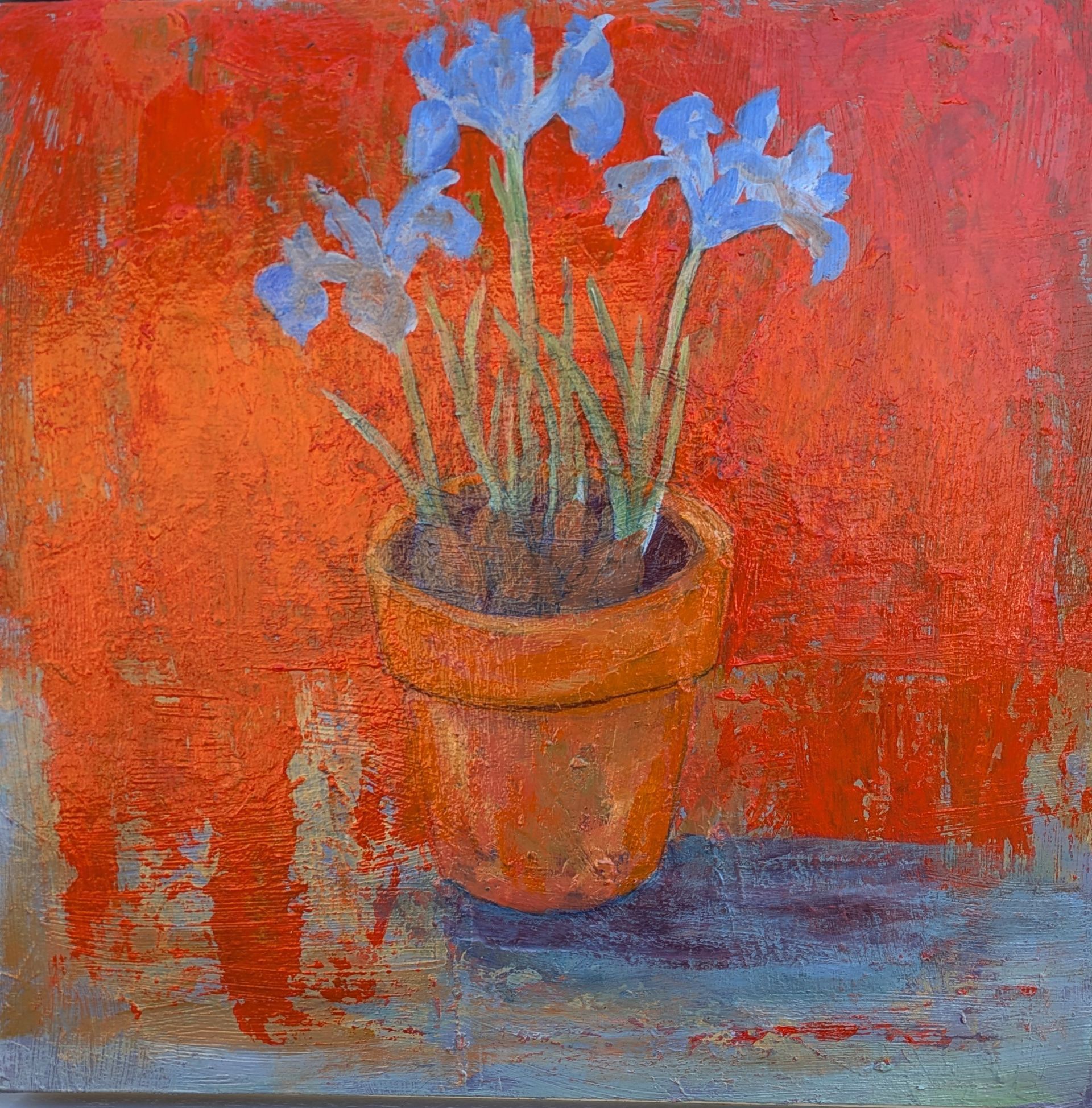 A painting of blue flowers in a pot on a red background.
