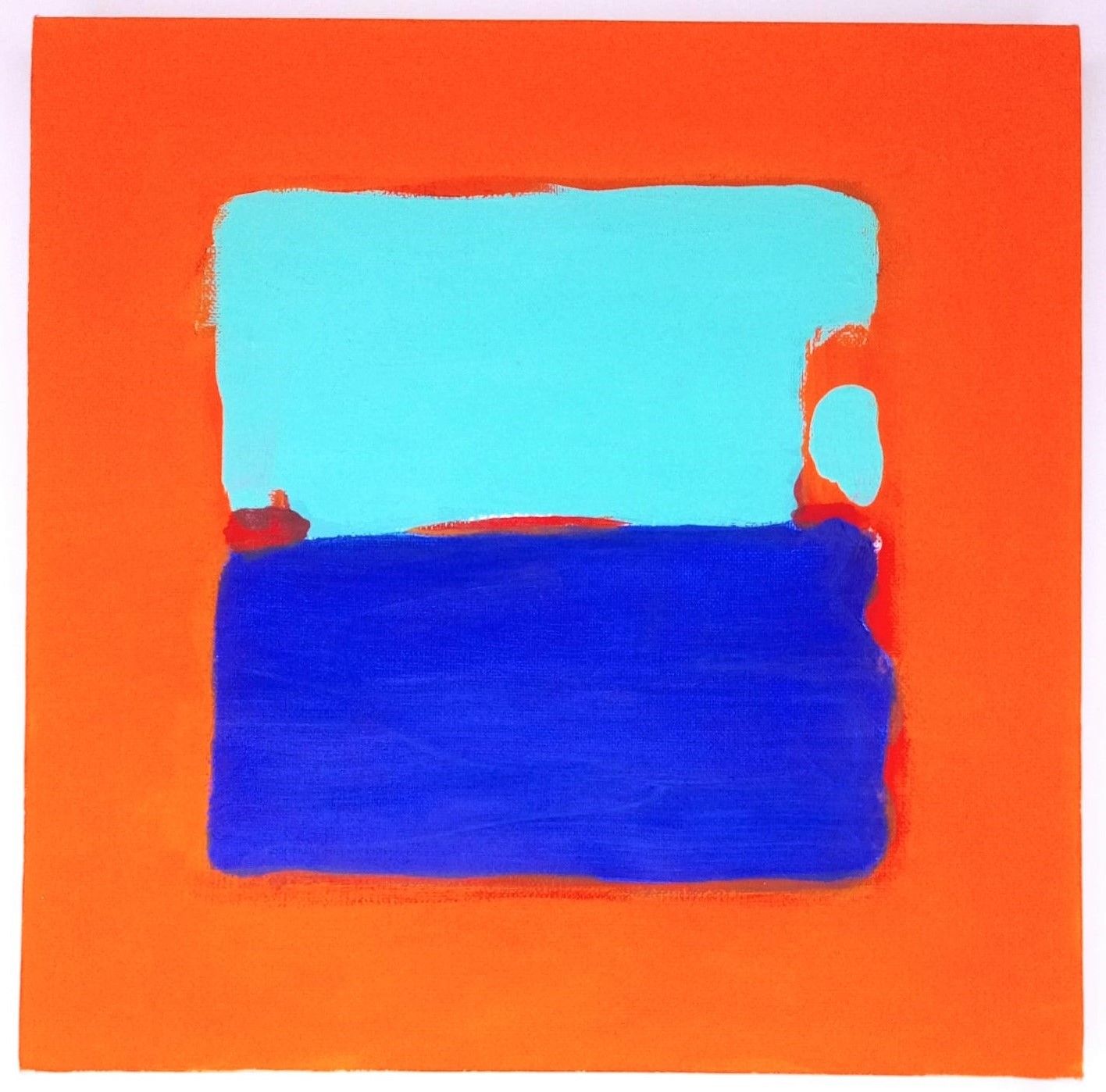 a blue and orange painting on an orange background