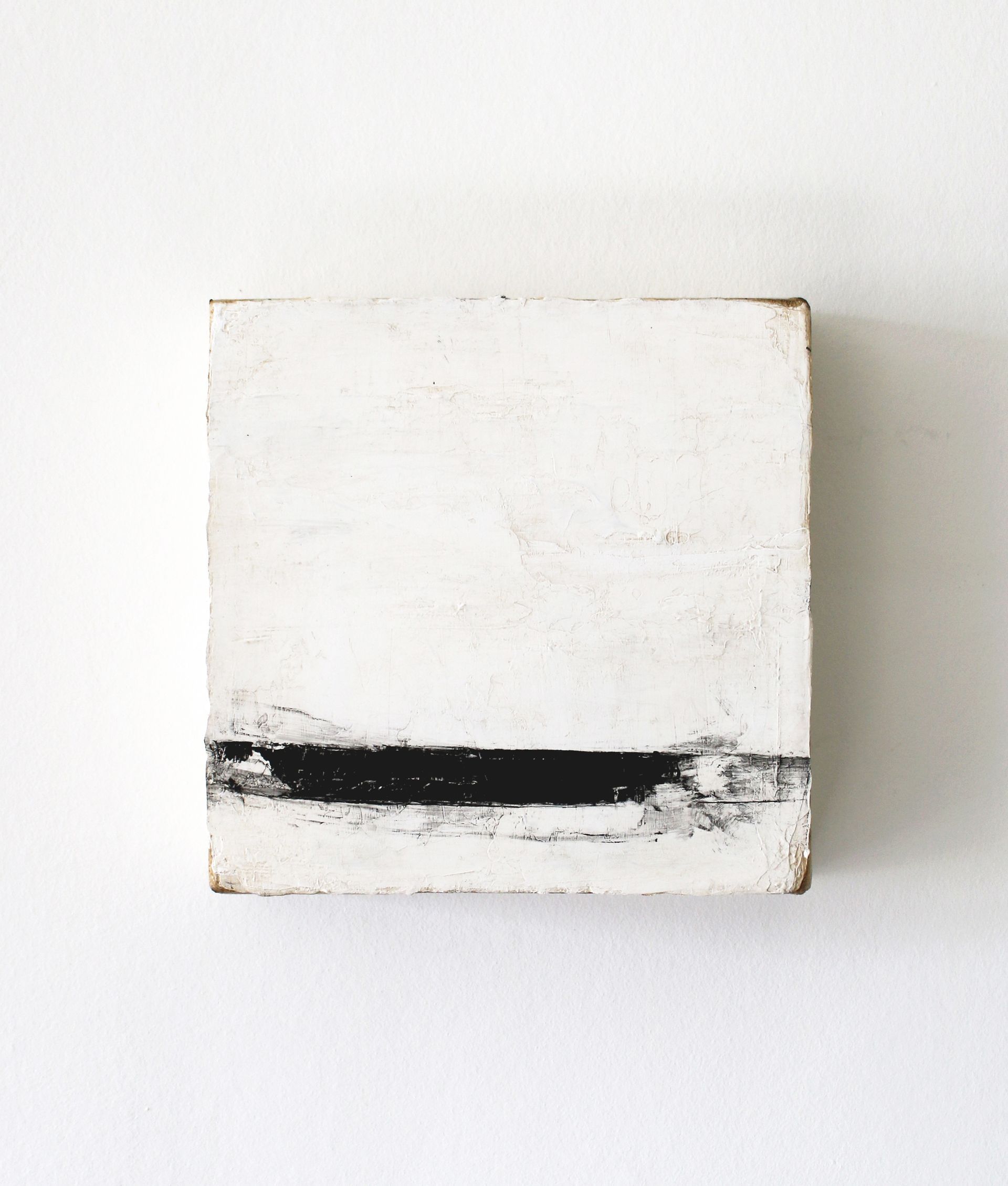 A white square with a black line on it