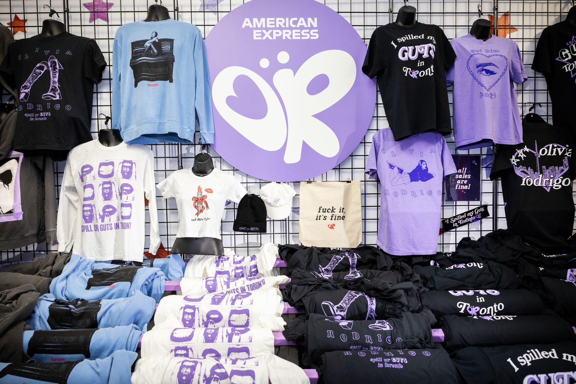 A display of american express t-shirts in a store