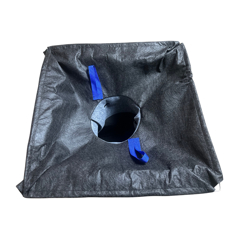 A square, black fabric landscaping bag with a circular center opening and two blue fabric handles.