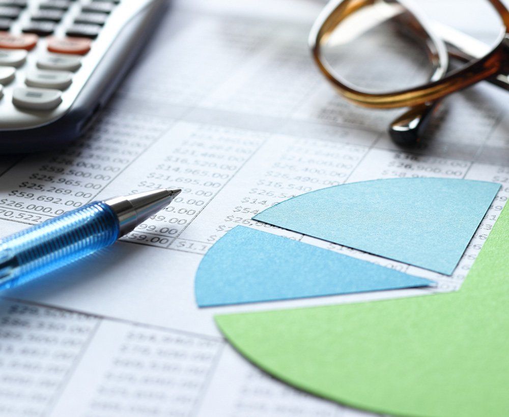 Business Accounting — Perth, WA — Owen & Plaistowe Commercial accounting forms being filled out in Perth