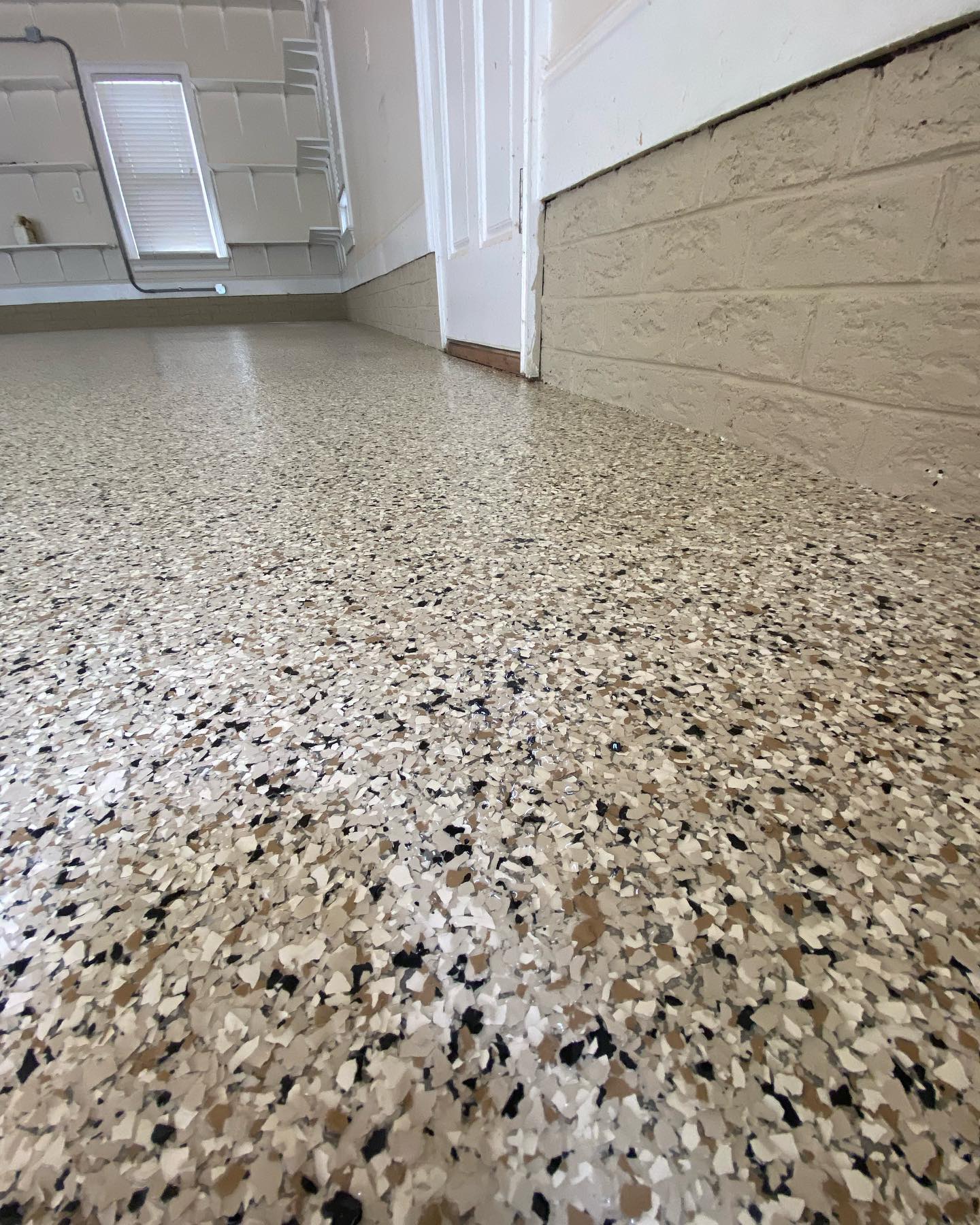 a close up of a concrete floor in a garage .