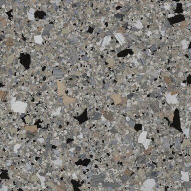 a close up of a gray and black granite counter top