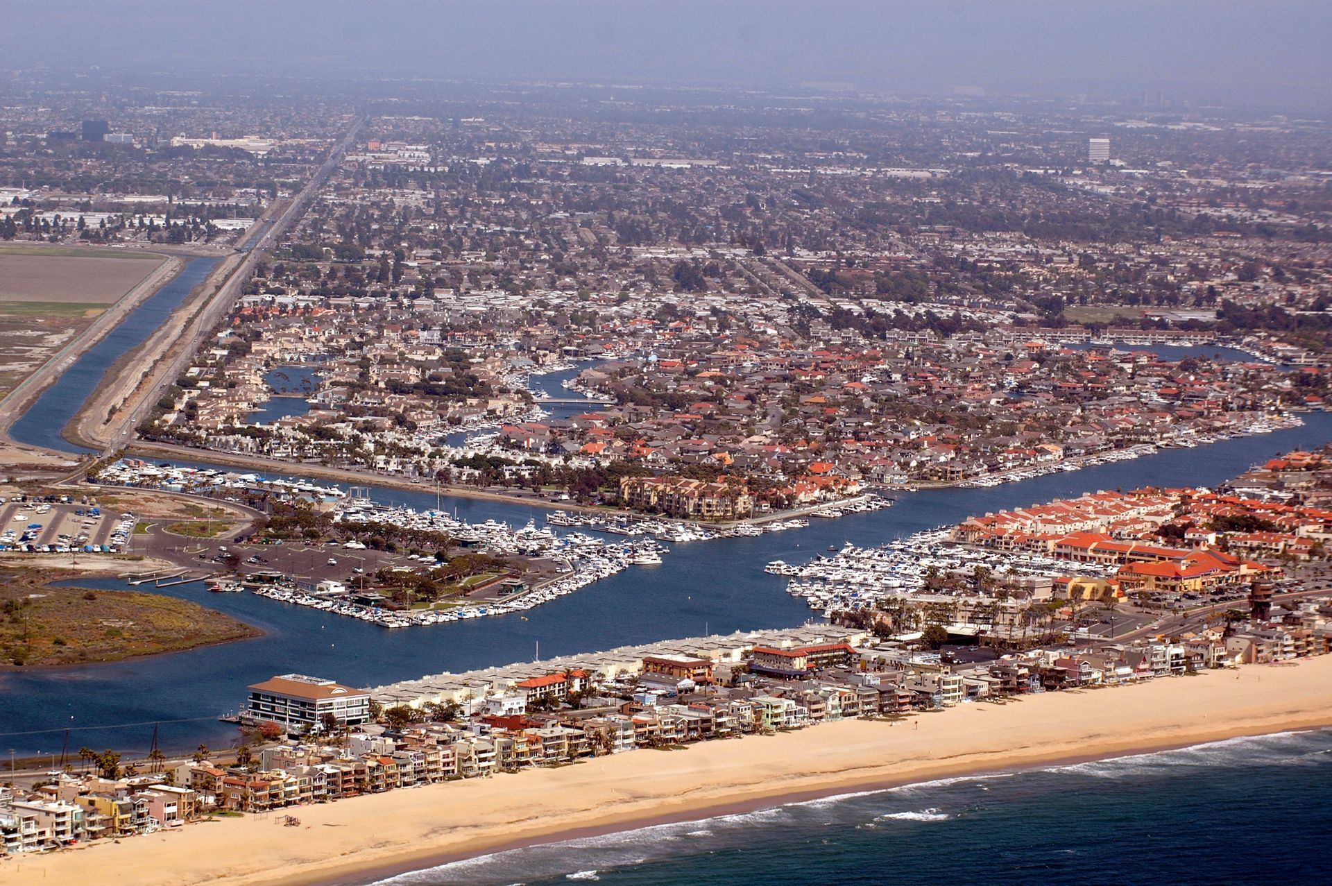 Huntington Harbour photograph by Don Ramey Logan An aerial view of a city and a body of water, Photograph by Don Ramey Logan