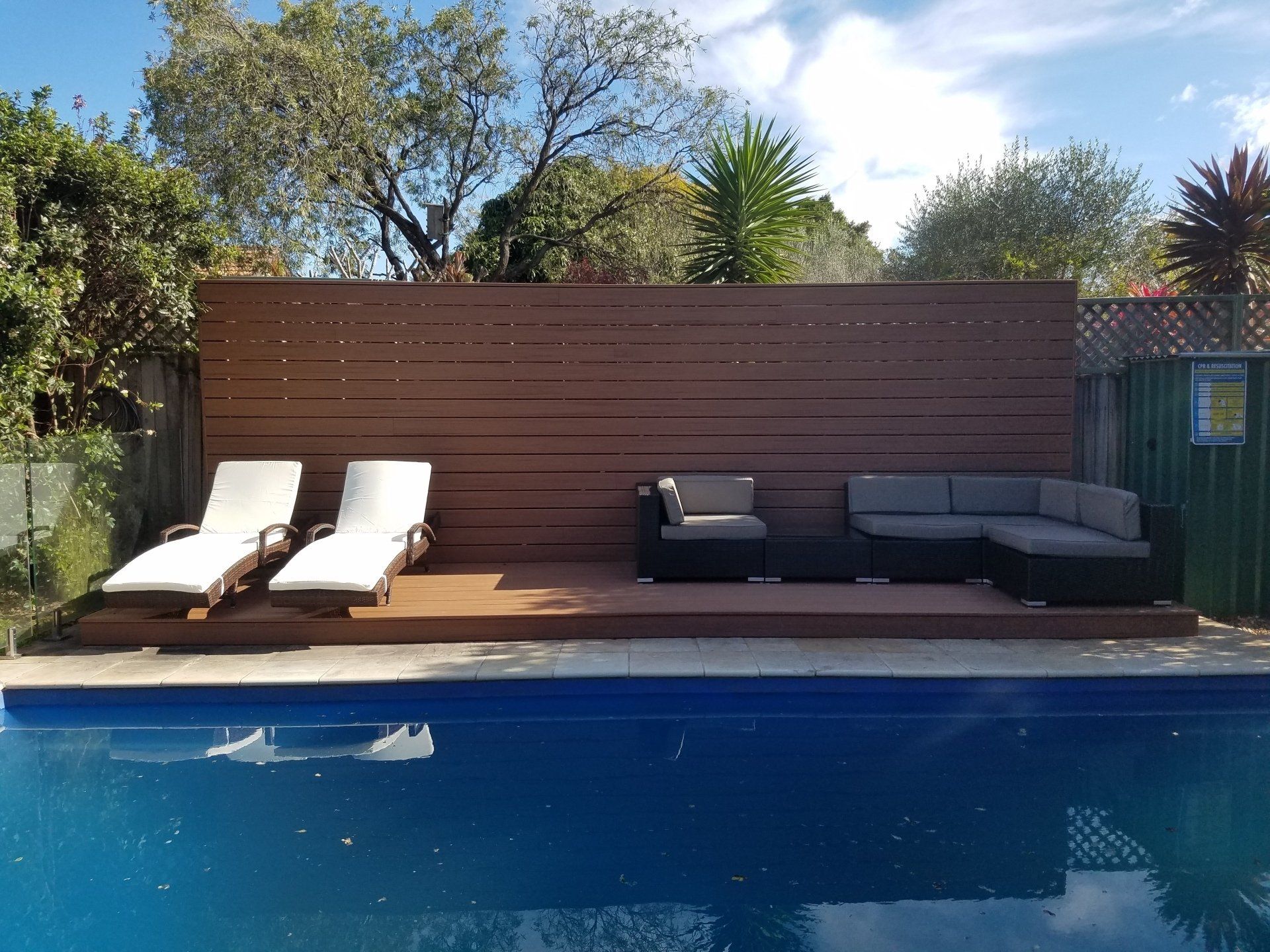 swimming pool with wood deck