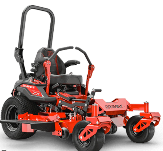 Red Gravely ZTX zero-turn riding lawn mower on a white background. It features black seat, armrests, and roll bar.