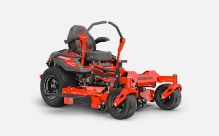 Red and black Bad Boy zero-turn lawnmower. It features a high-back seat, control levers, and a wide cutting deck.