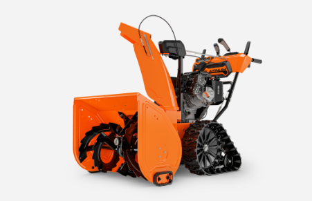 Orange and black snow blower with tracks on a white background.