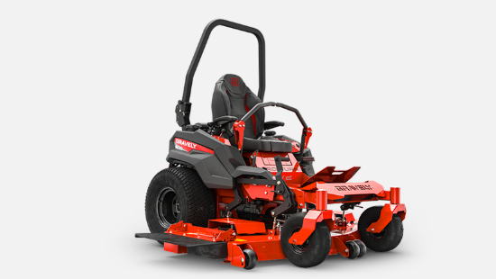 Red and black zero-turn lawnmower with large tires, a comfortable seat, and a roll bar, set against a white background.