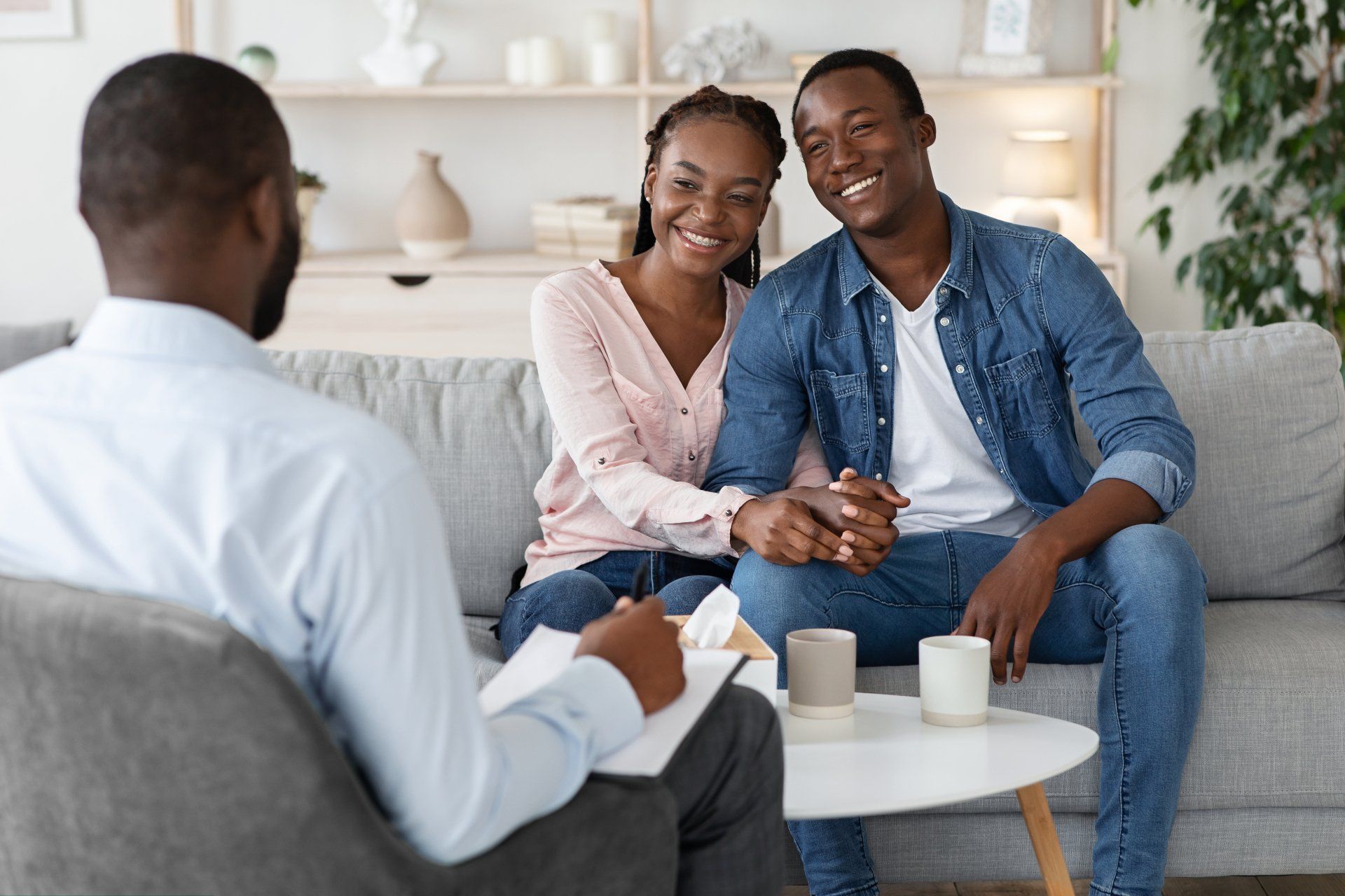 Church leader counseling a couple
