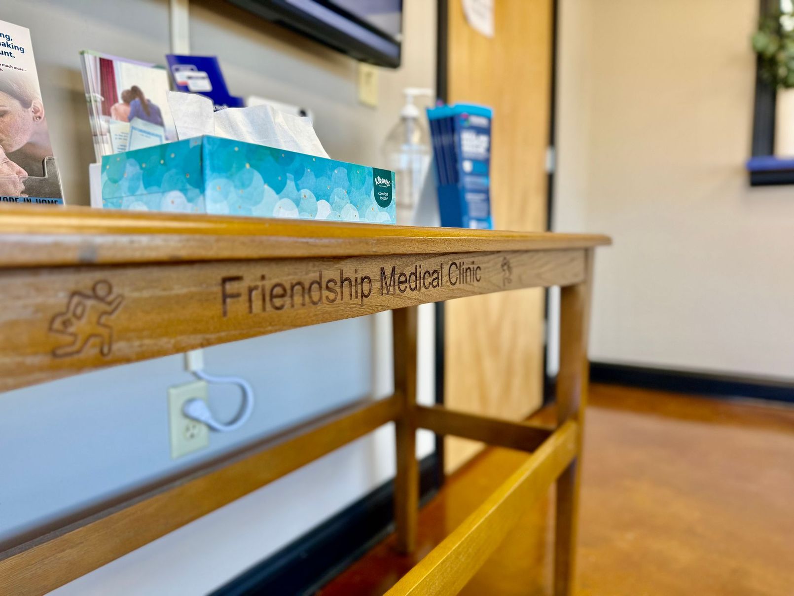 A wooden table with the engraving