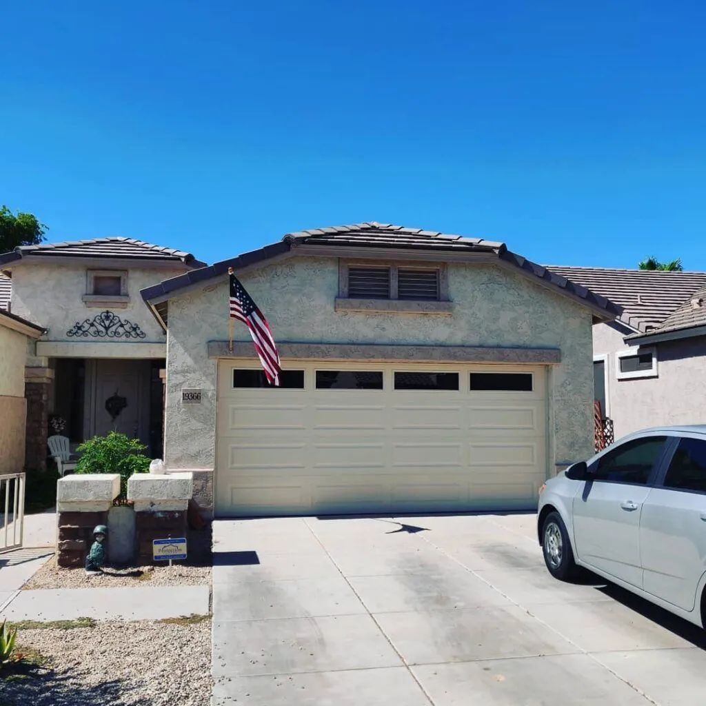  Southwest Suburban Home with Garage Door and American Flag