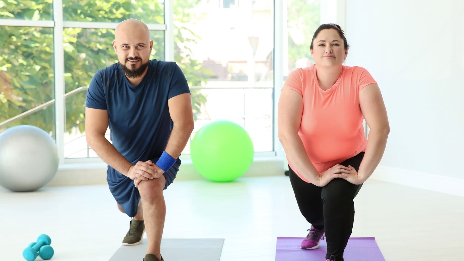 Two people working out.