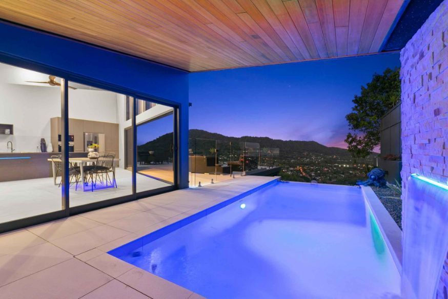 There is a Large Swimming Pool in the Middle of the House — Omni Builders In Bungalow, QLD