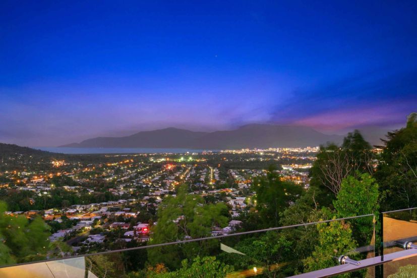 A View of a City From a Balcony at Night — Omni Builders In Bungalow, QLD