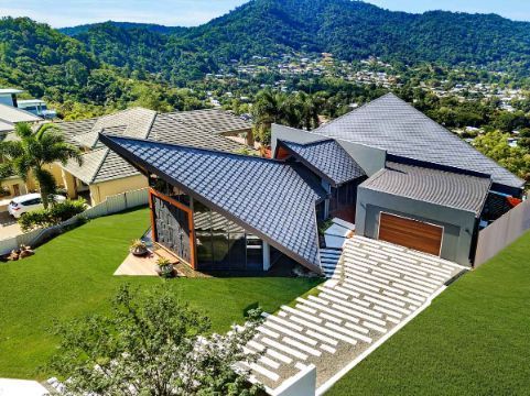 An Aerial View of a House With a Roof That is Shaped Like a Triangle — Omni Builders In Bungalow, QLD