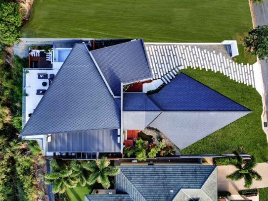 An Aerial View of a House With a Triangle Shaped Roof — Omni Builders In Bungalow, QLD