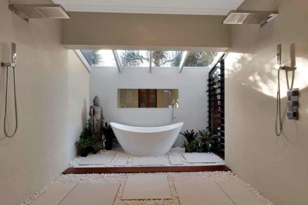 A Bathroom With a Bathtub and Two Showers — Omni Builders In Bungalow, QLD