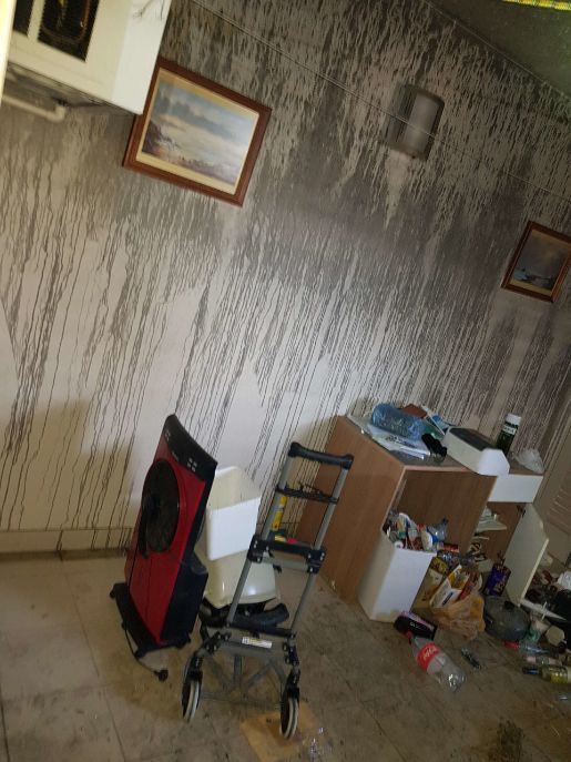 A Room With a Walker and a Picture on the Wall — Omni Builders In Bungalow, QLD