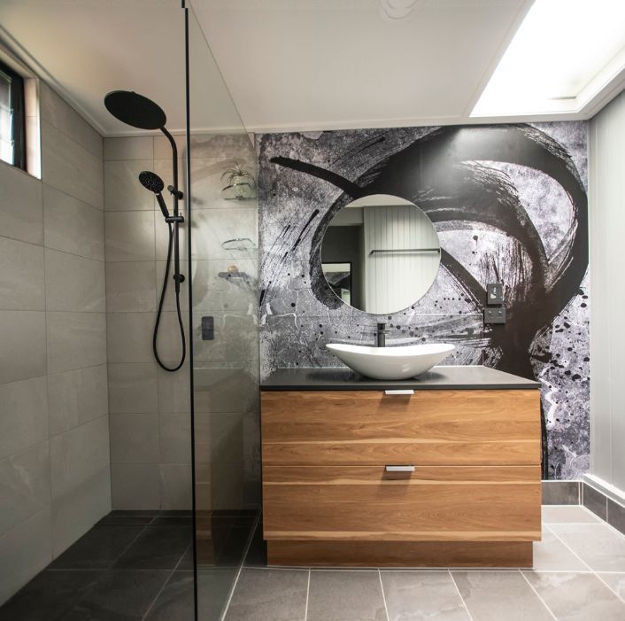 A Bathroom With a Sink and a Walk in Shower — Omni Builders In Bungalow, QLD