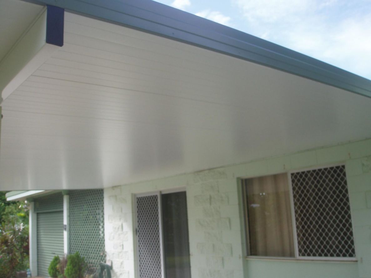 A House With a White Roof and Blue Trim — Omni Builders In Bungalow, QLD