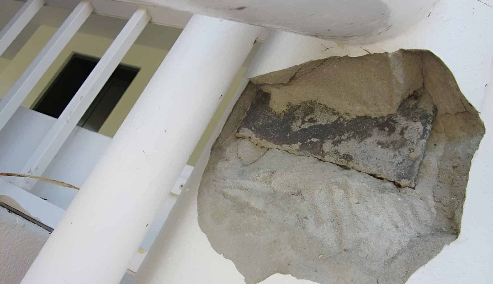A Hole In A Wall With A Pillar In The Background — Omni Builders In Bungalow, QLD