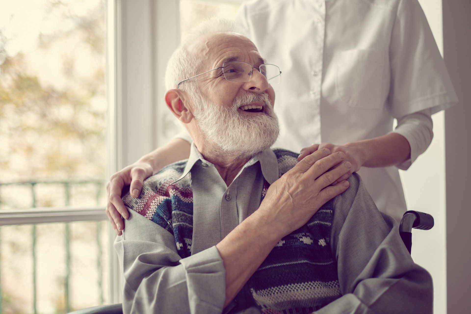 Senior Man Sitting on the Wheelchair — Lakeland, FL — Better Living for Seniors of Polk County