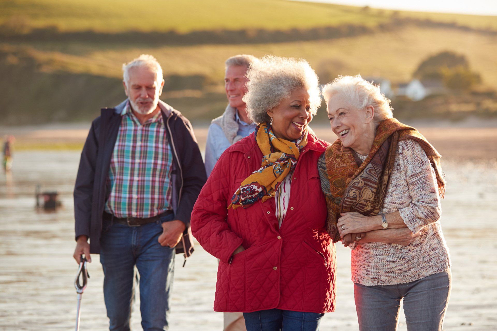 Smiling Senior Friends Walking — Lakeland, FL — Better Living for Seniors of Polk County