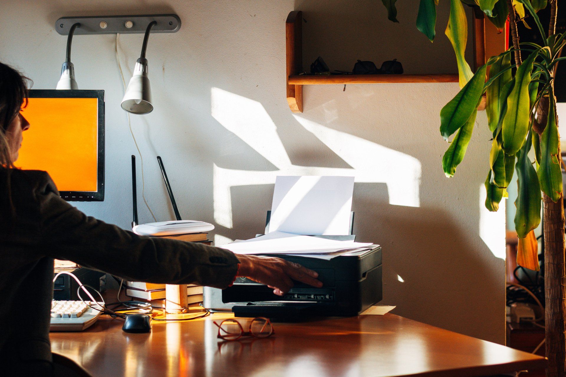 Woman Using Printer — Lakeland, FL — Better Living for Seniors of Polk County