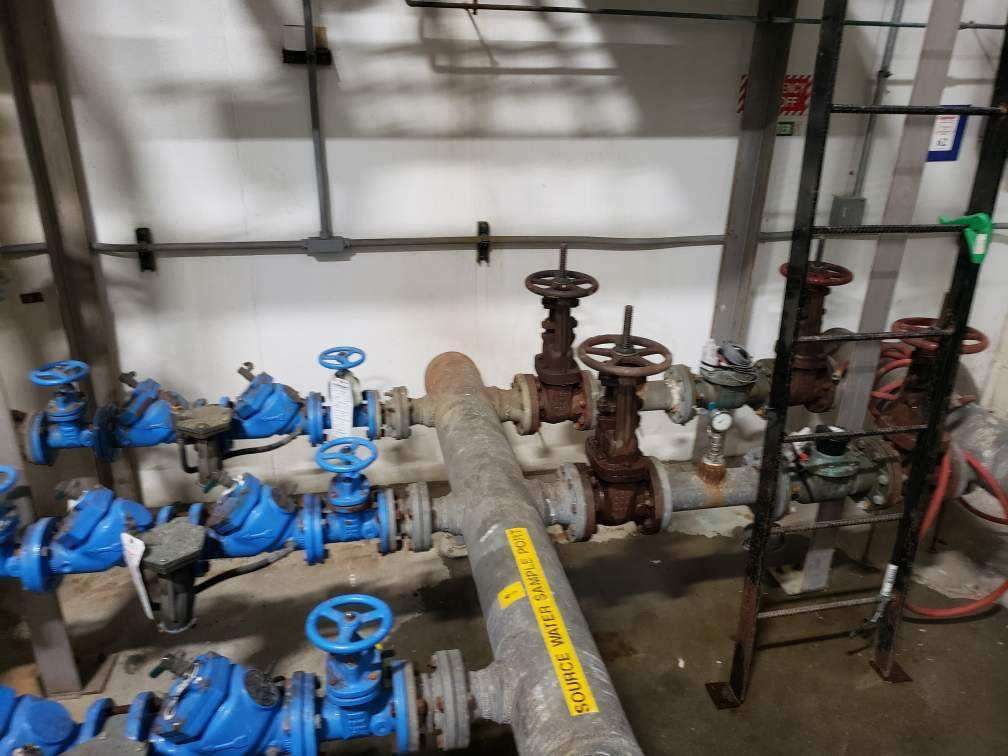 A room filled with lots of pipes and valves.