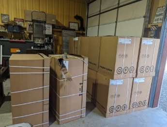 A bunch of cardboard boxes stacked on top of each other