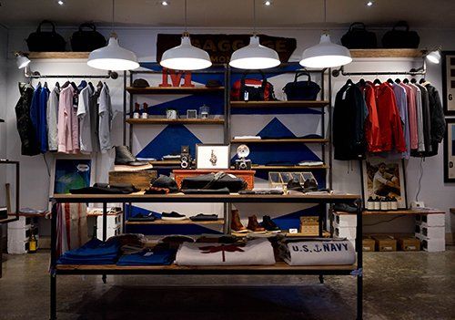 custom metal shelves in retail boutique