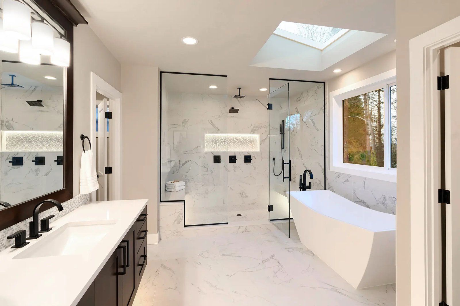 Master bathroom renovation in Rosemead with freestanding tub and double vanity.