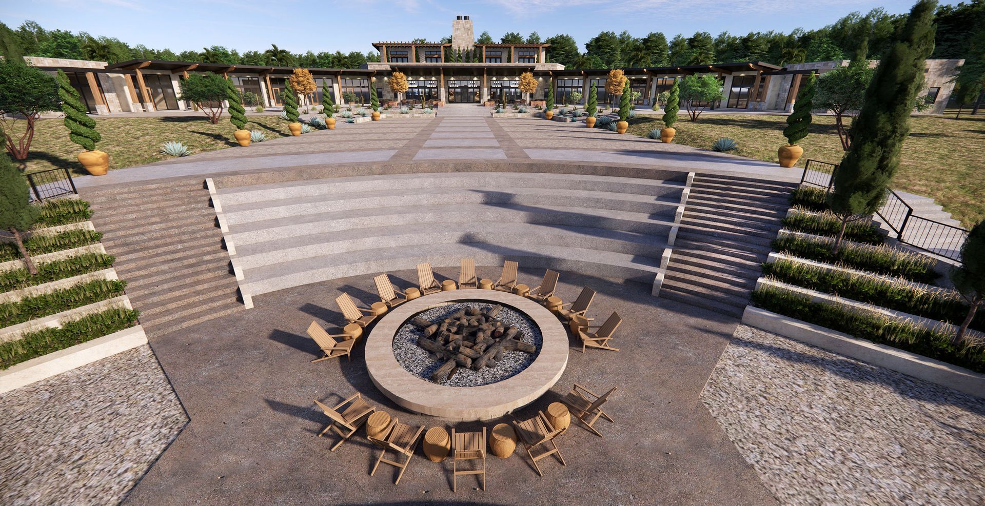 A large stone fire pit surrounded by chairs, situated in front of terraced seating and a modern architectural structure.