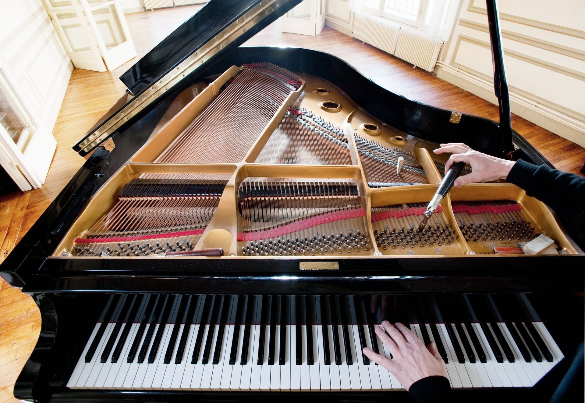 Piano Being Tuned — Cedar Rapids, IA — Pete’s Piano Service Piano Being Tuned — Cedar Rapids, IA — Pete’s Piano Service