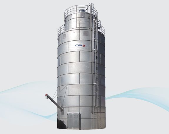 Tall silver industrial silo with a ladder and piping against a white background