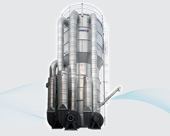 Industrial stainless steel filtration tank system with multiple vertical vessels and black pumps
