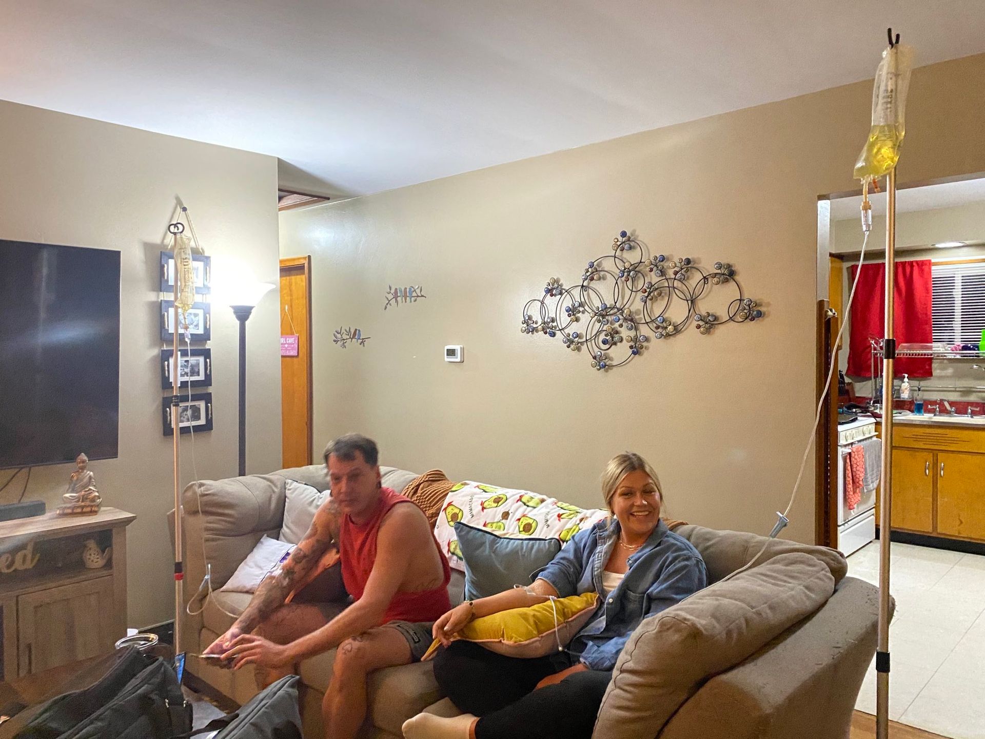Two clients relaxing during in-home IV therapy
