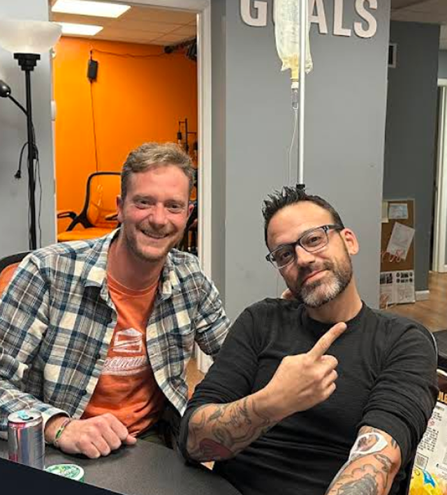 Two clients smiling during IV therapy