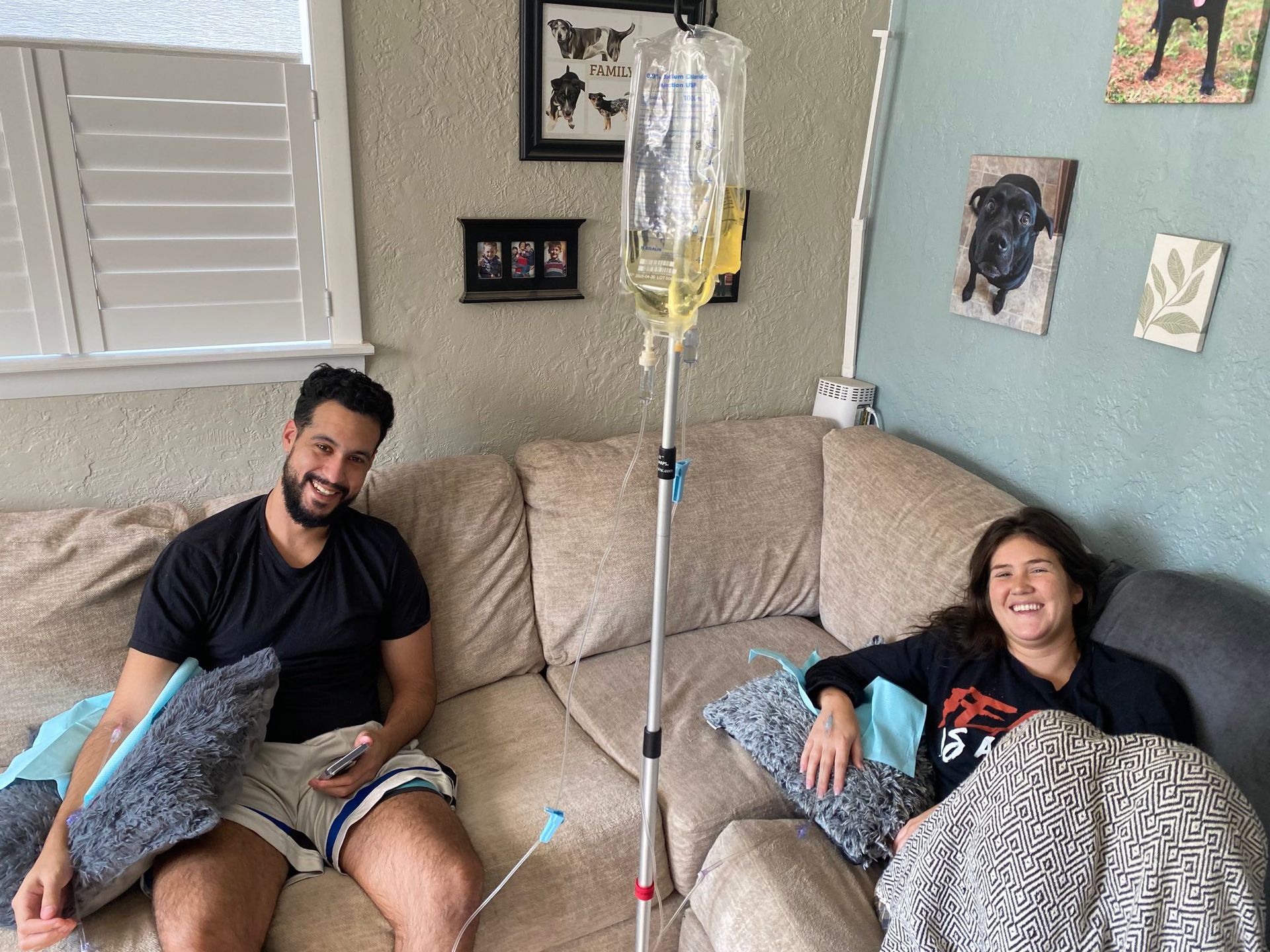 Couple relaxing during in-home IV therapy