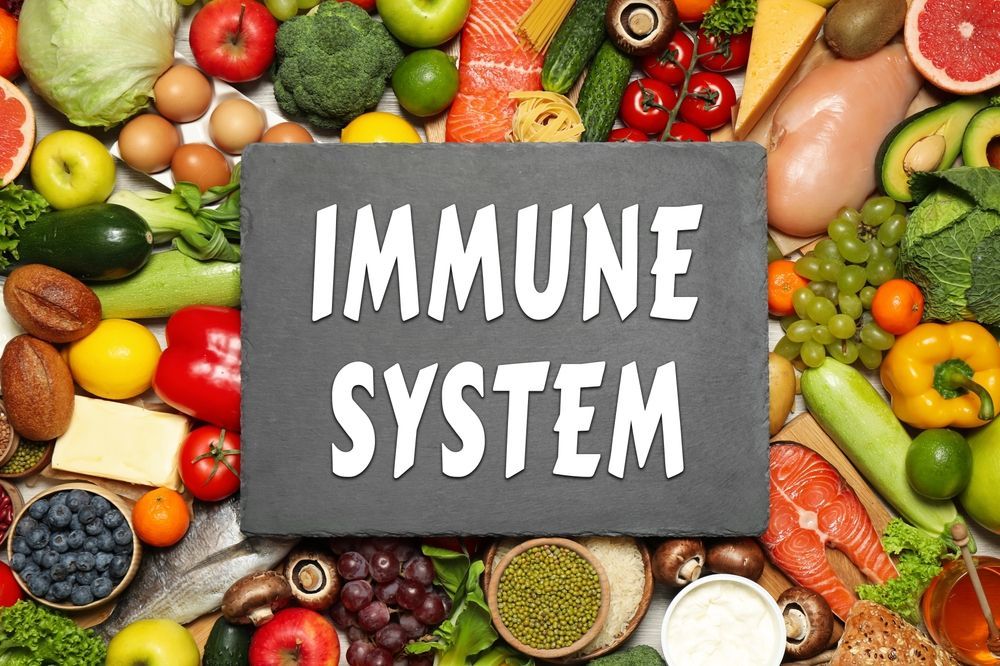 A sign that says `` immune system '' is surrounded by fruits and vegetables.