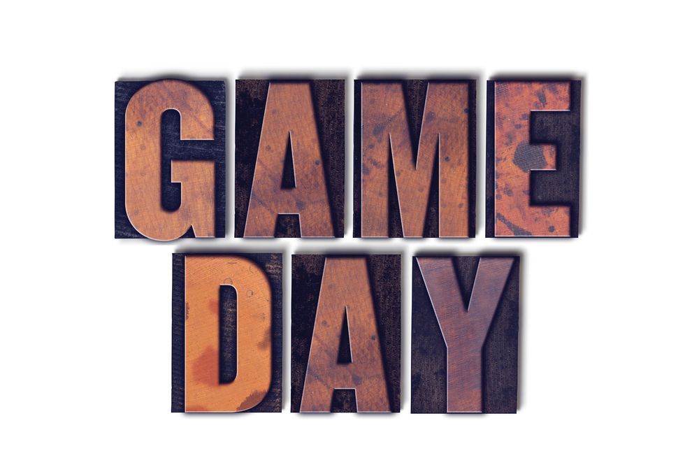 Vintage letterpress blocks spelling Game Day