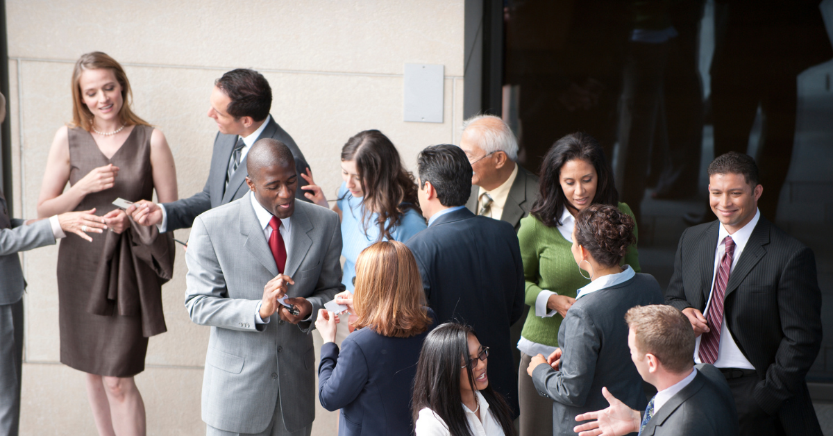 people standing and networking together